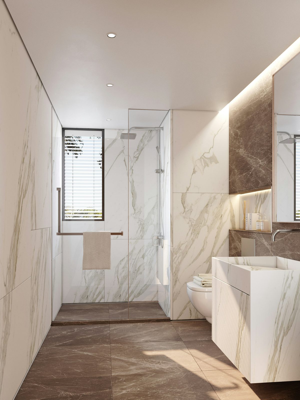 A marble ensuite with a walk-in shower